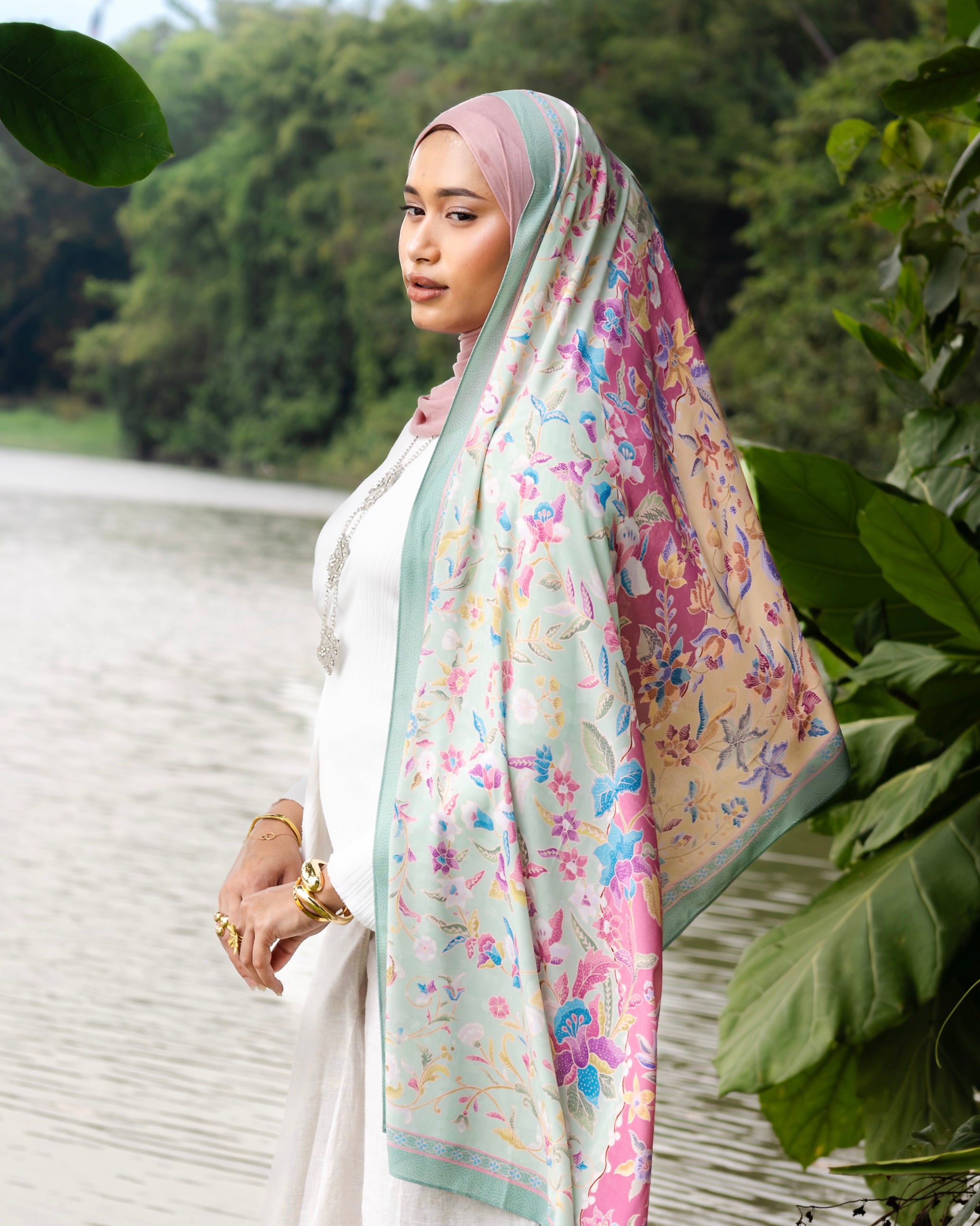 Woman wearing a Soof Sarung in Hannah floral chiffon headscarf.