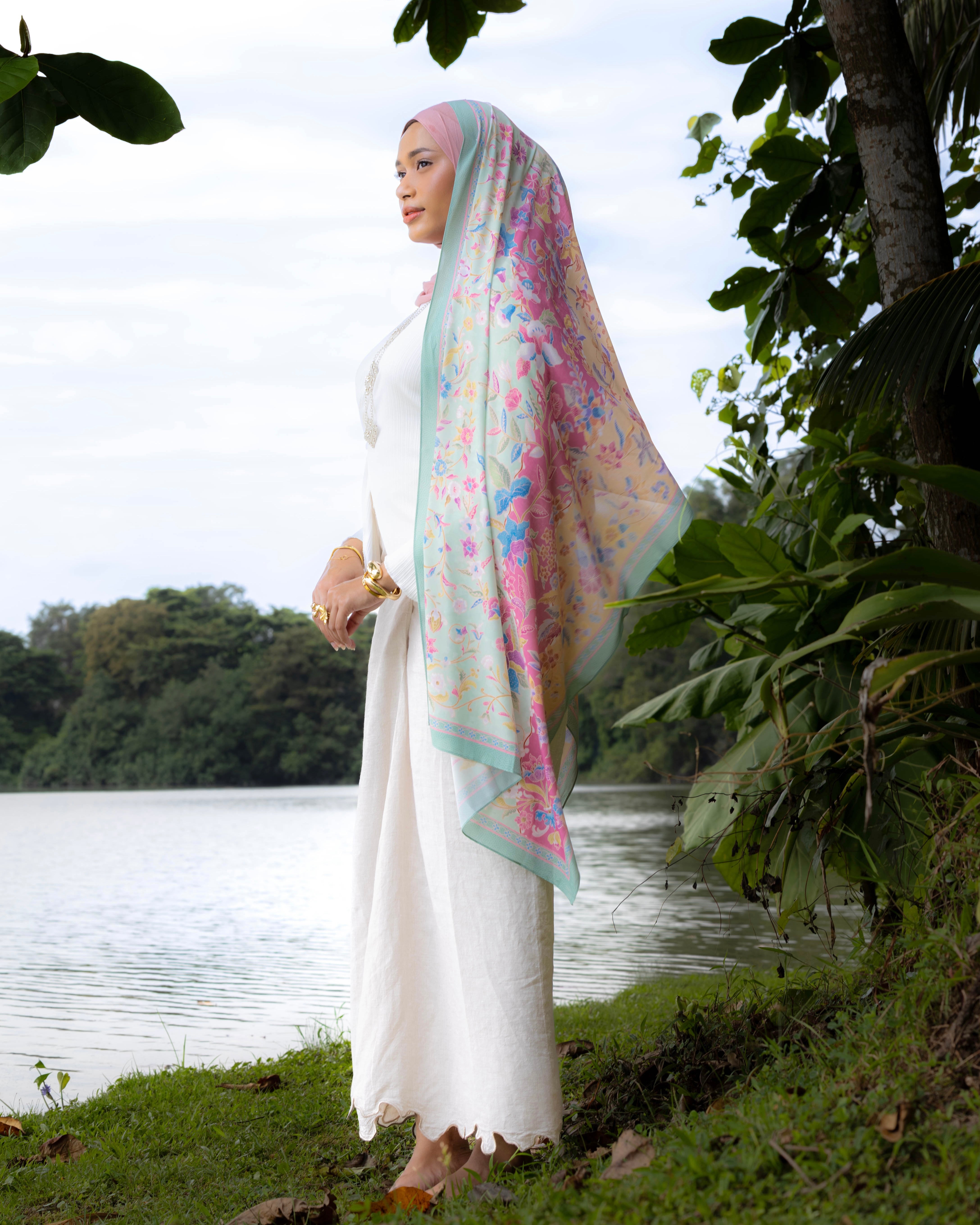 Woman wearing a Soof Sarung in Hannah floral chiffon headscarf. 